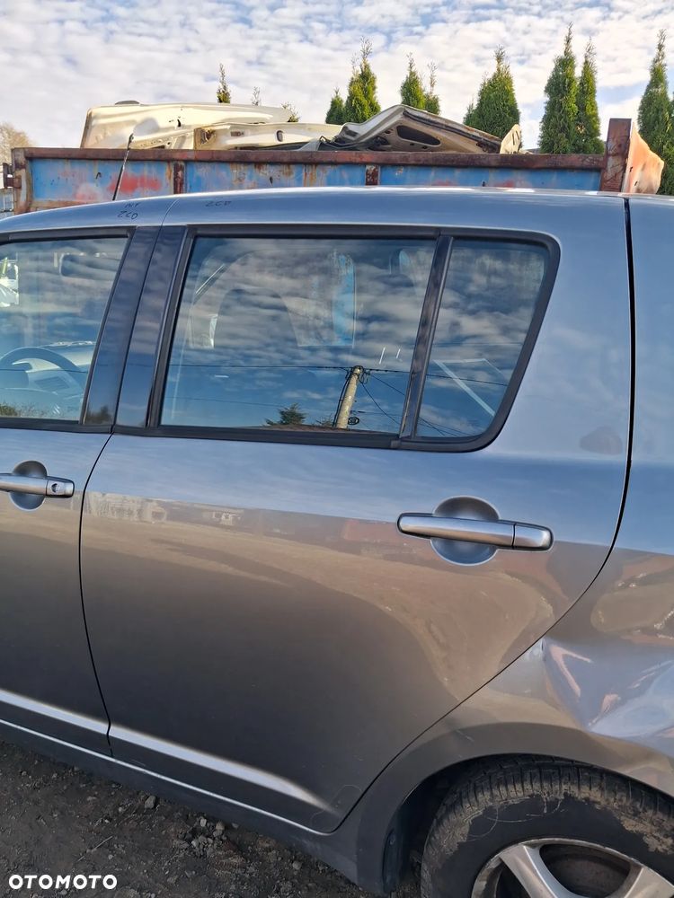 Suzuki Swift 05 drzwi lewy tyl ZCD - 3
