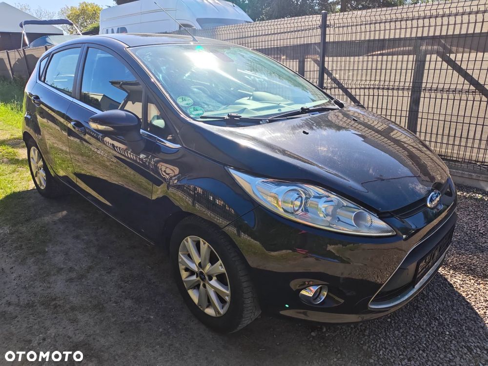 Ford Fiesta 1.4 Autom Ghia - 3