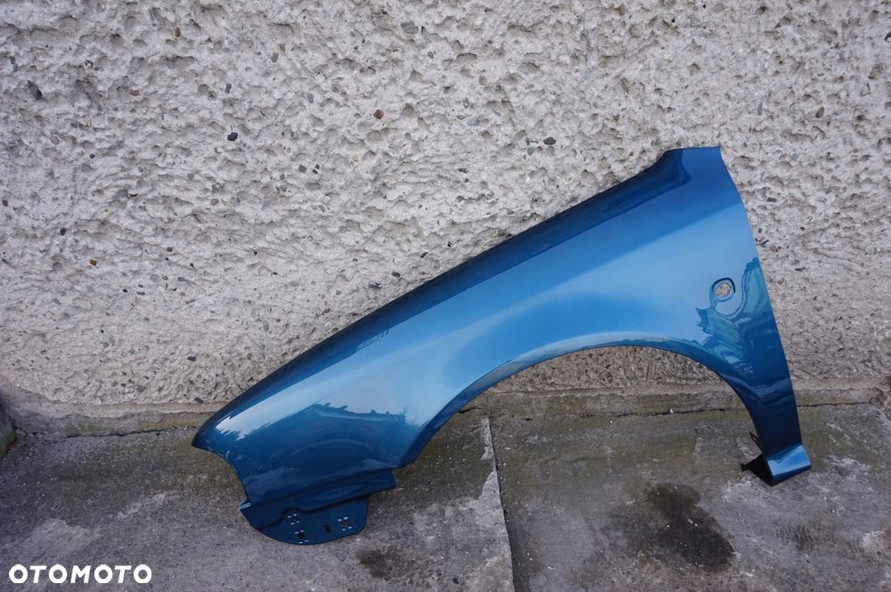 BŁOTNIK LEWY SKODA OCTAVIA I 1 9432 - 4