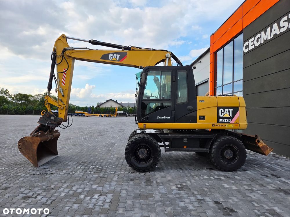 Caterpillar 313D / ze Szwajcarii / tylko 8100 mth / - 2