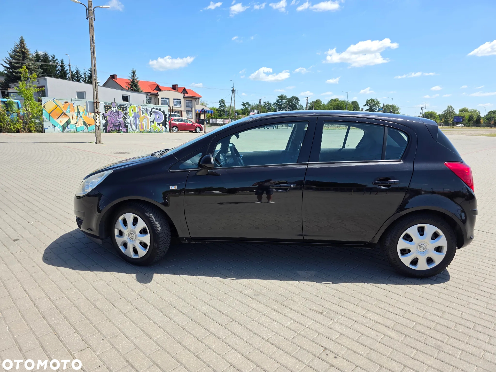 Opel Corsa 1.2 16V Cosmo - 5