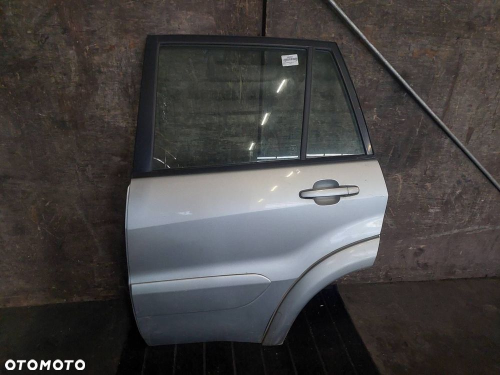 DRZWI KOMPLETNE LEWY TYŁ TOYOTA RAV4 II LIFT 1D4 5D - 5
