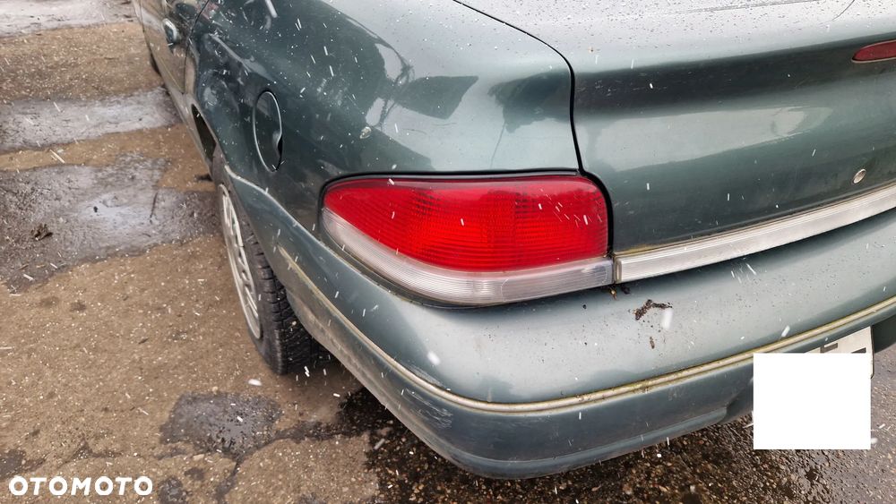 CHRYSLER CIRRUS LAMPA TYŁ LEWA - 1