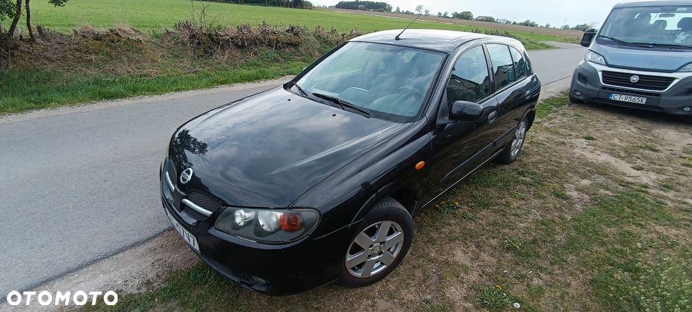 Nissan Almera 1.5 Comfort High - 1