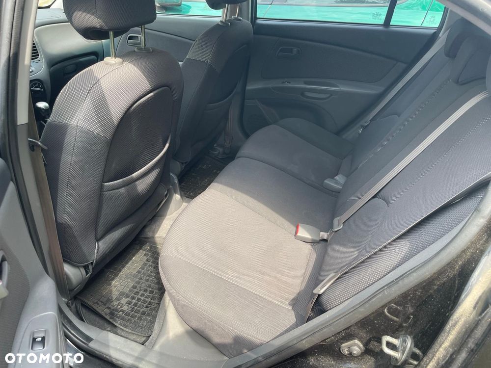 Kia Rio 1.4 Family + - 7