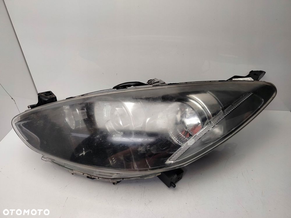 mazda 2 de 2011r reflektor lampa lewy przód lewa przednia soczewka - 3
