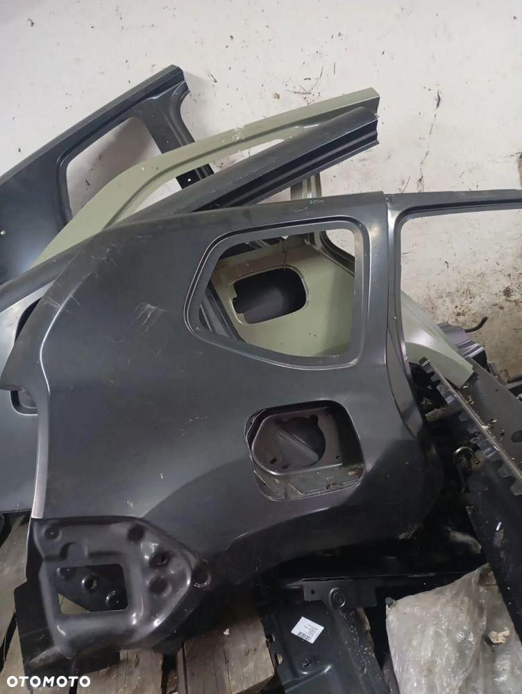 POSZYCIE BŁOTNIKA PRAWY TYŁ DACIA DUSTER I - 1