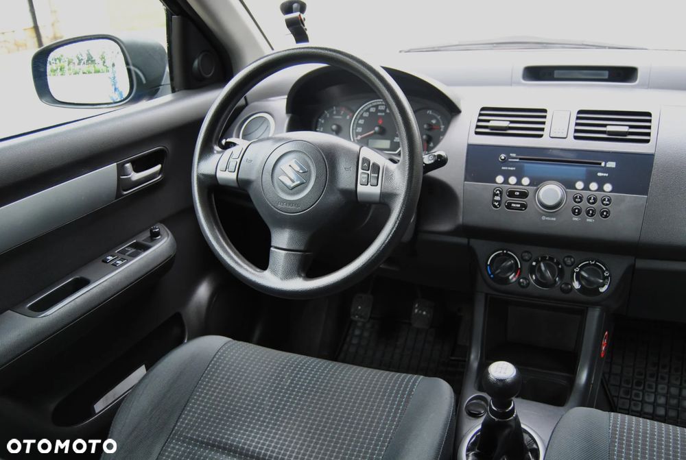 Suzuki Swift 1.3 Club - 11