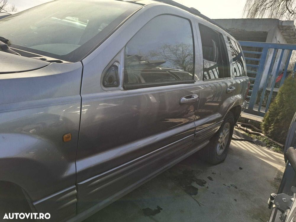 Usa dezechipata stanga/dreapta, fata/spate Jeep Grand Cherokee 2004 - 2