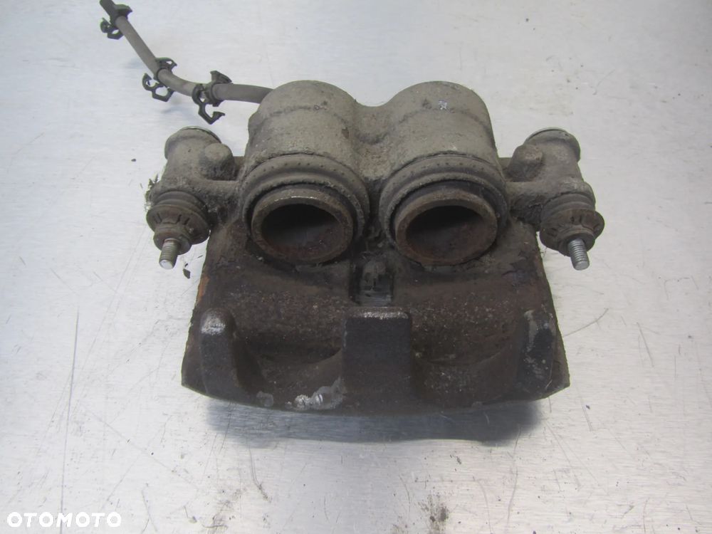 Iveco Daily 14->2.3 HPI zacisk hamulcowy prawy przód 42560073 - 4