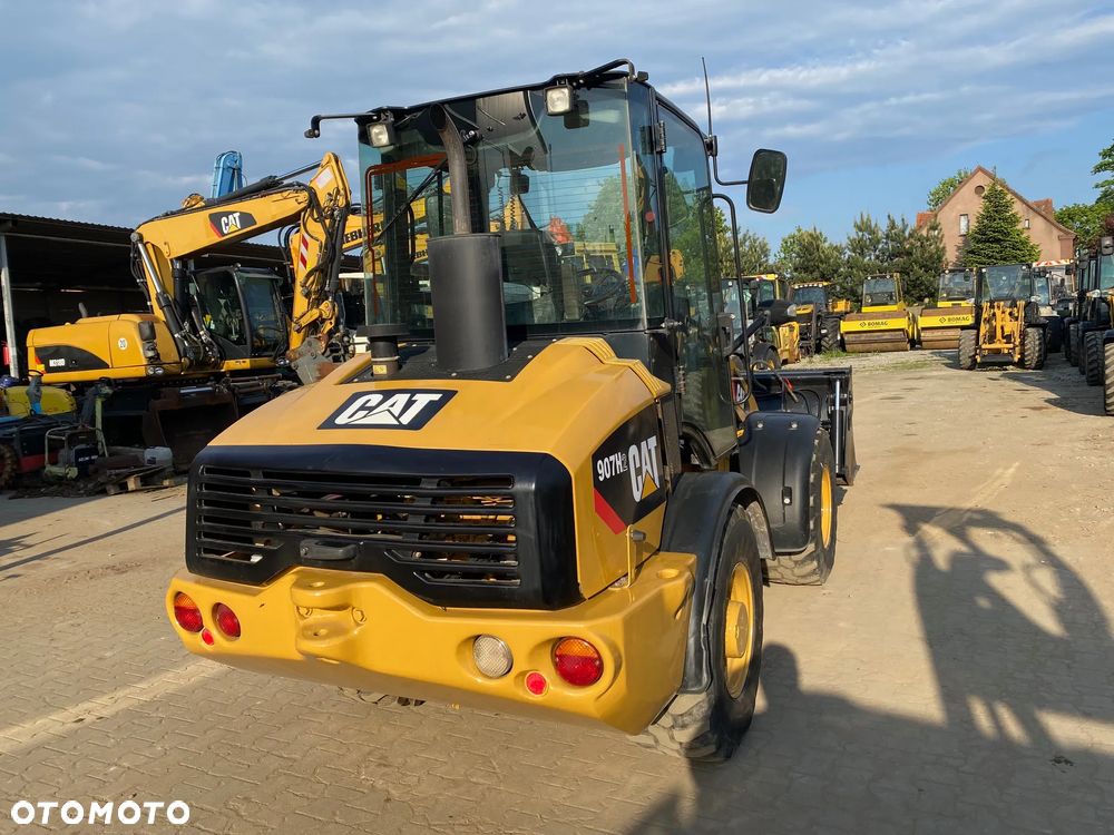 Caterpillar CAT 907H2, 5800 MTH, ŁYŻKA OTWIERANA + WIDŁY, z NIEMIEC, - 6