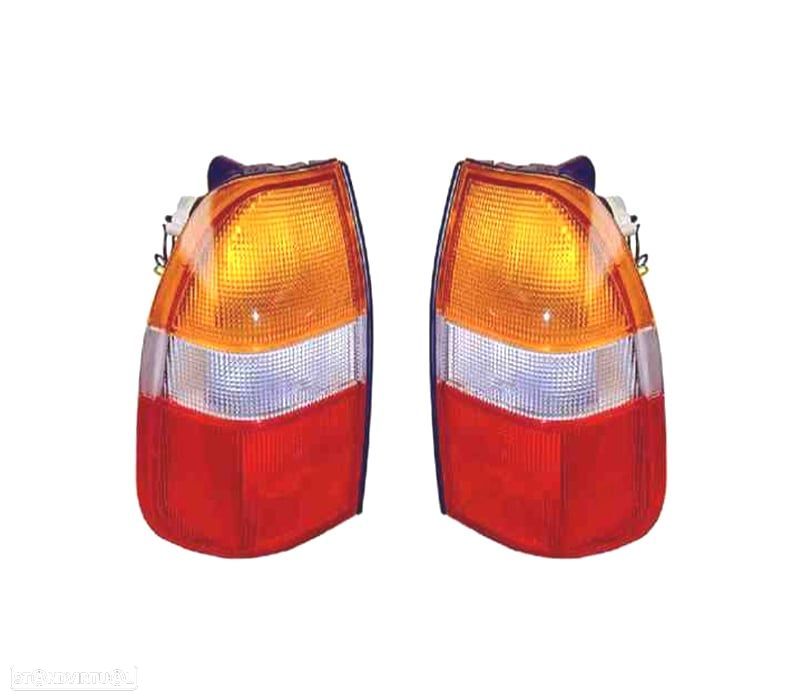 FAROLINS PARA MITSUBISHI L200 K74 96-06 - 1