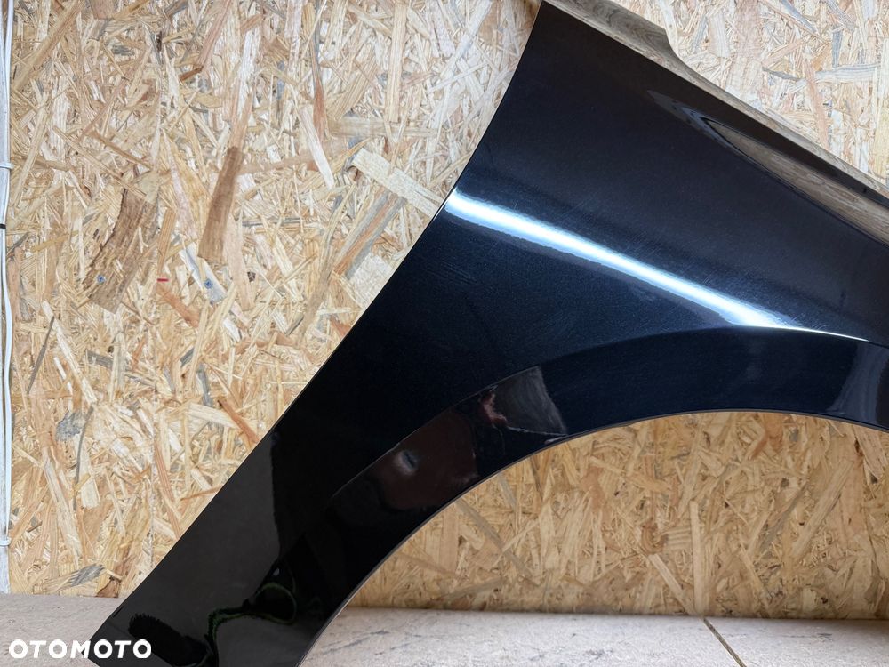 BŁOTNIK PRAWY PRZÓD PRZEDNI PRAWY OPEL ASTRA L CZARNY METALIK - 24