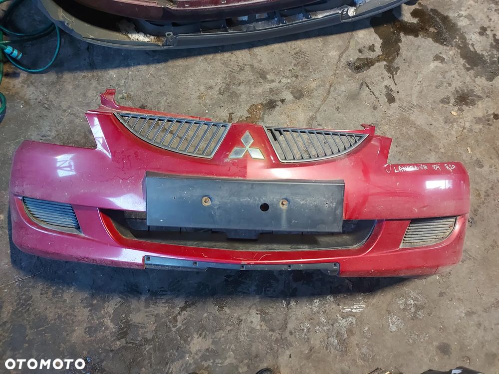 Zderzak przód przedni  MITSUBISHI LANCER VIII 04' kod R20 - 1