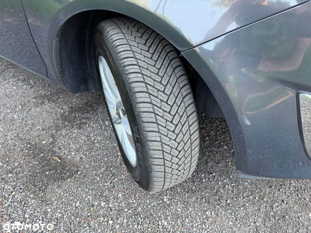 Opel Corsa 1.2 16V Cosmo - 6