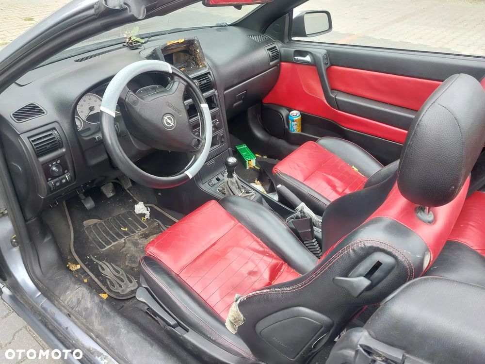 Opel Astra G Bertone Cabrio Cabriolet silnik 1.6 16v 103 KM skrzynia biegów F17 drzwi maska zderzak błotnik lusterko klapa Z4AU Z163 dach dachu składanego maglownica szyba podnośnik fotel kanapa zegary zestaw startowy czujnik felga maglownica zwrotnica sterownik panel moduł listwa wydech tłumik belka sanki zacisk jarzmo tarcza NA CZĘŚCI WSZYSTKIE CZĘŚCI - 23