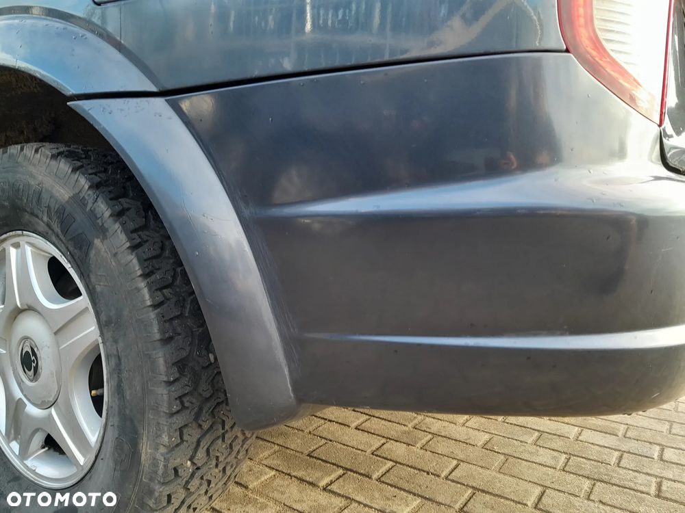 SSANGYONG KYRON ZDERZAK TYLNY TYŁ - 9