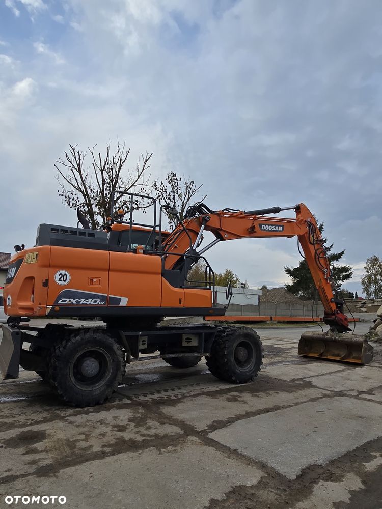 Doosan 140 w5 - 3