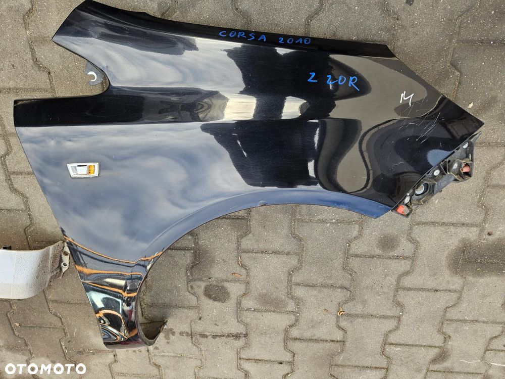 Opel Corsa D Błotnik przód przedni prawy  Z20R - 2