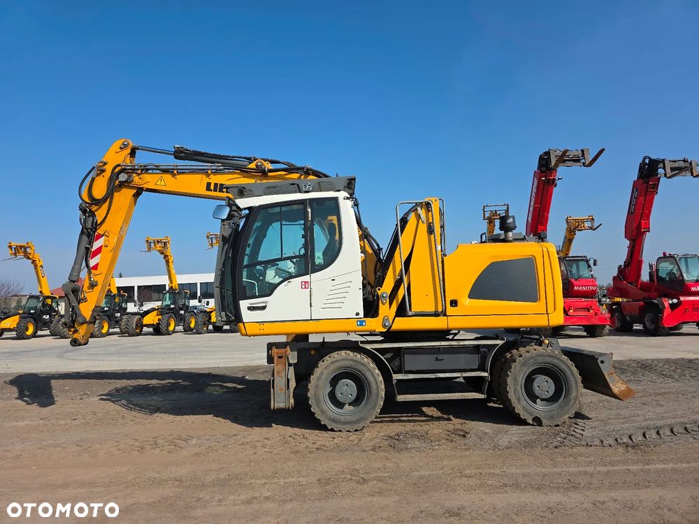 Liebherr A 914 Litronic jak TEREX CAT SENNEBOGEN M497 - 7
