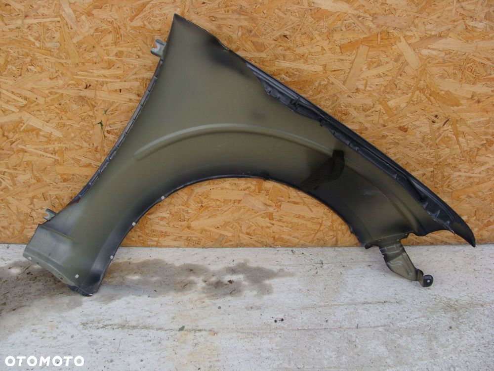 błotnik lewy nissan navara d40 bez rdzy !!! - 6