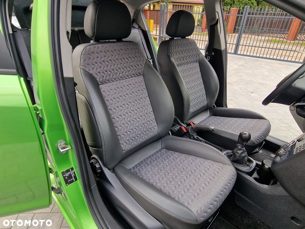 Opel Corsa 1.4 16V Cosmo - 7