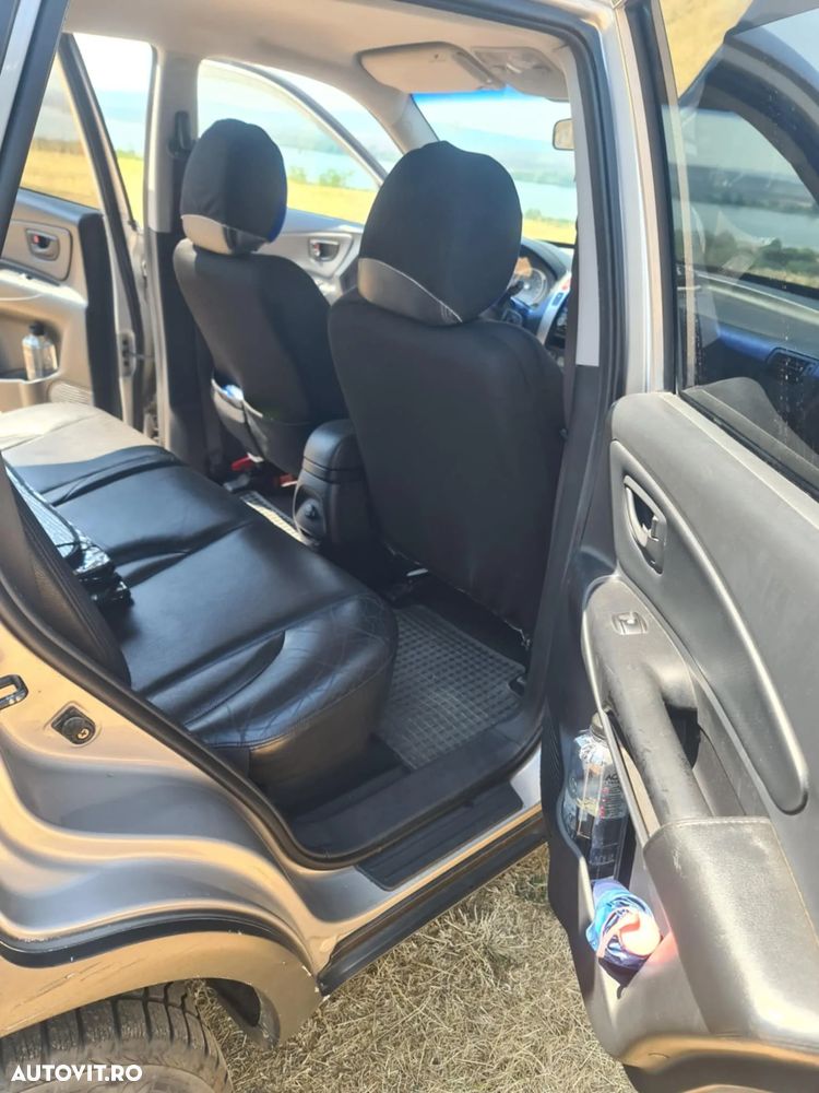 Hyundai Tucson 2.0 CRDI 4WD GLS - 8