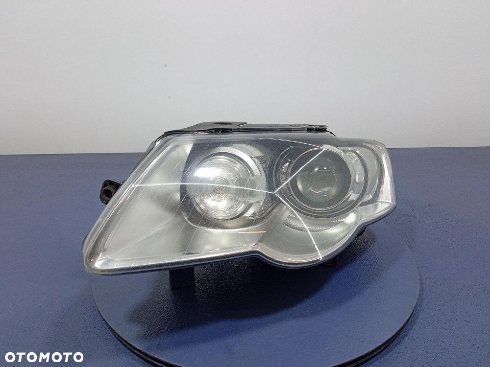 VW PASSAT B6 05- REFLEKTOR LEWY BIXENON SKRĘTNY EU 3C0941751G - 1