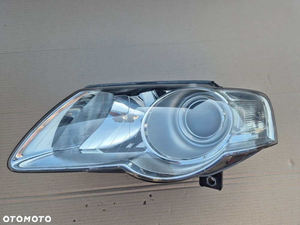 VW Passat B6 reflektor lewy.Valeo. 100%.2005-2010. - 2