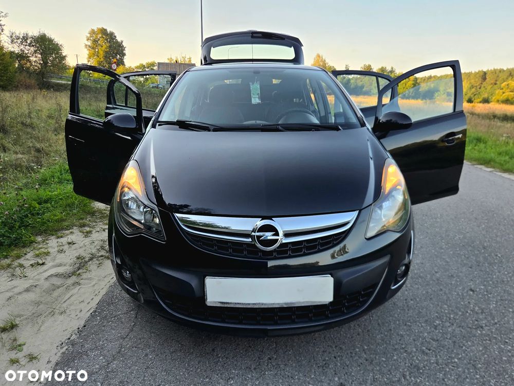 Opel Corsa 1.2 16V Enjoy - 23