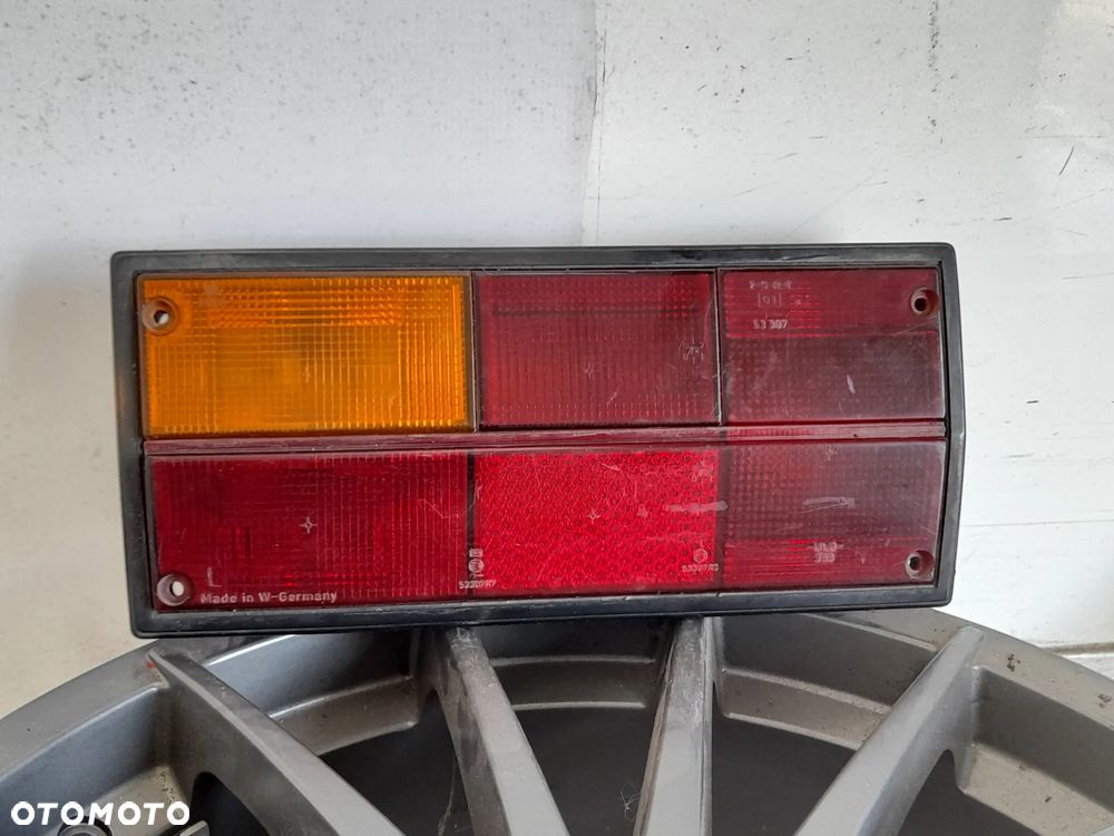 Lampa lewy tył Volkswagen Transporter T3 Hella 251945111