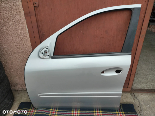 MERCEDES w164 ML 05- drzwi przód Lewe kod lakieru C775 775 SREBNE gołe