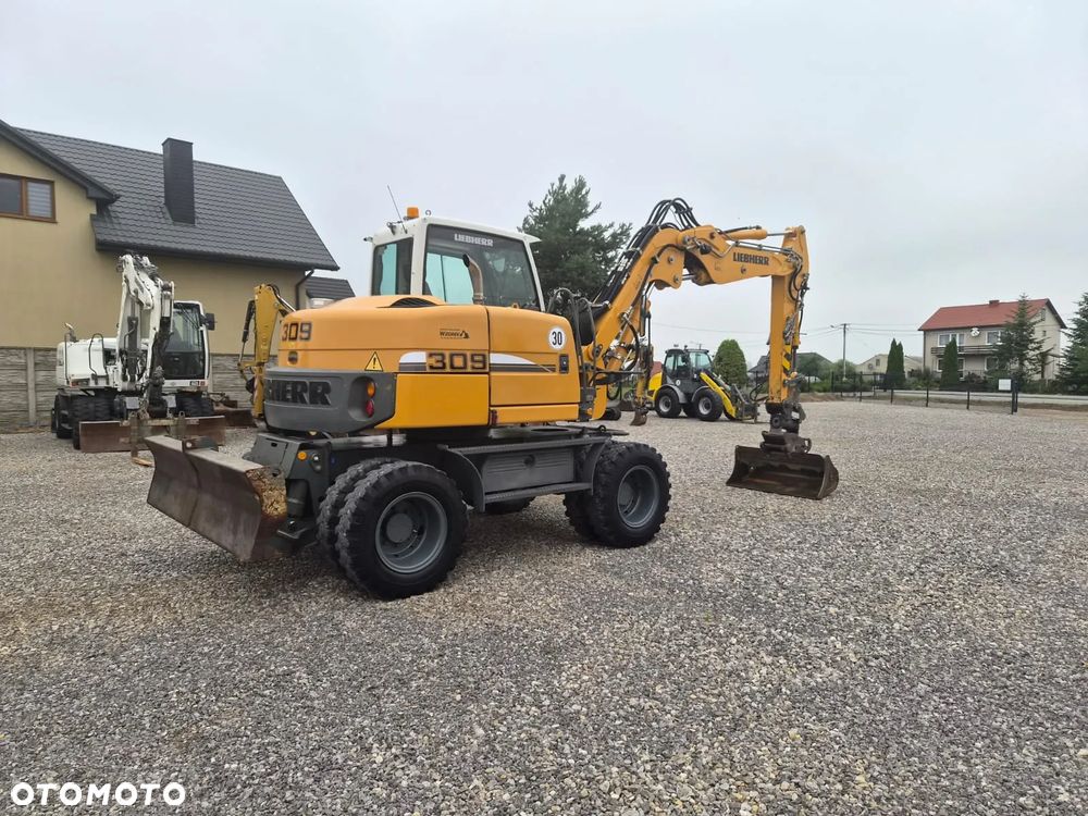 Liebherr A 309 Litronic - 2