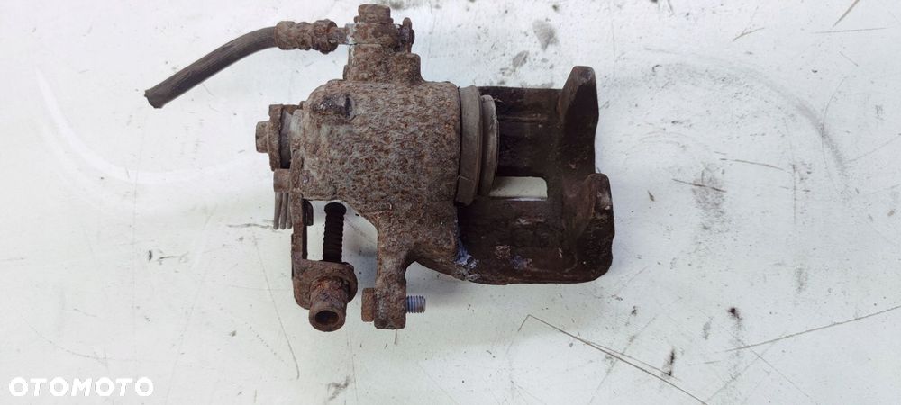 ZACISK HAMULCOWY LEWY TYŁ AUDI A4 B6 B7 288 MM - 4