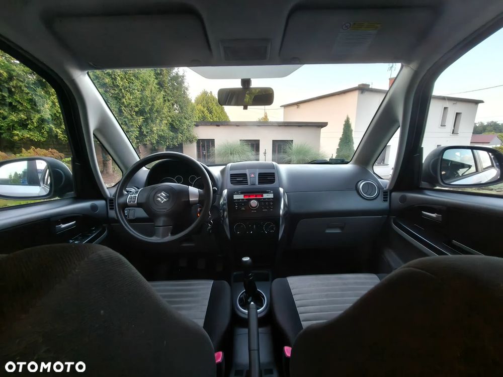 Suzuki SX4 1.6 Comfort Plus - 12