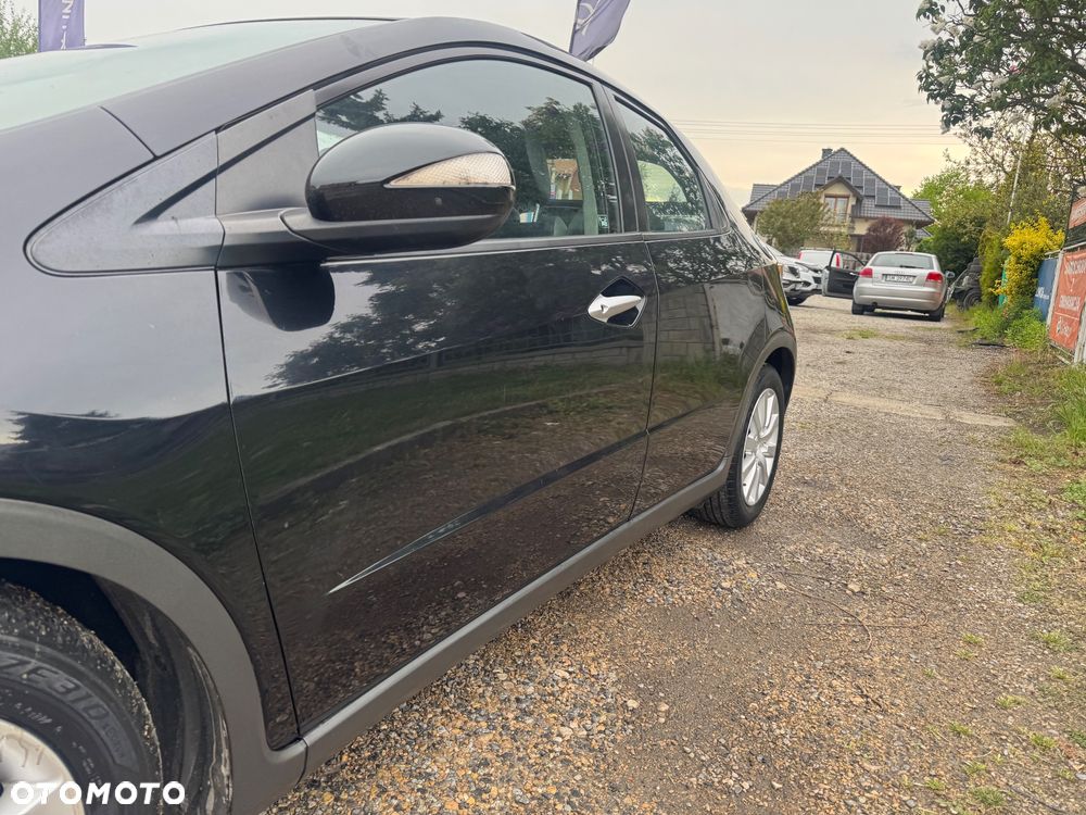 Honda Civic 1.8 Comfort - 13