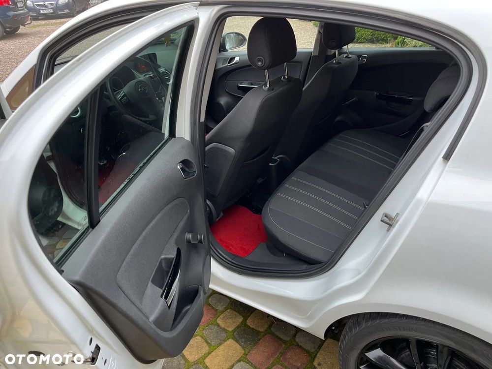 Opel Corsa 1.4 16V Cosmo - 11
