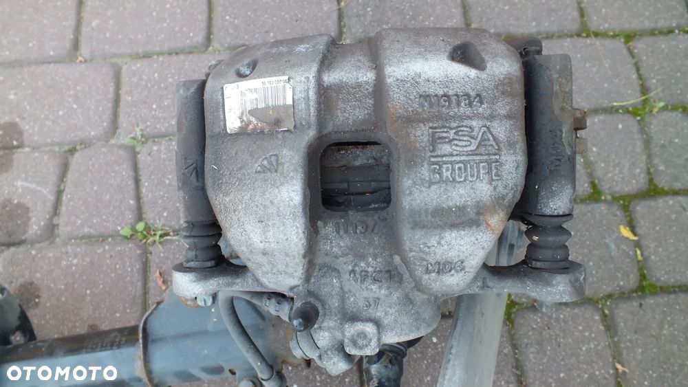 Amortyzator zwrotnica MCperson lewy Citroen C4 III 1,2 9842993480 - 9