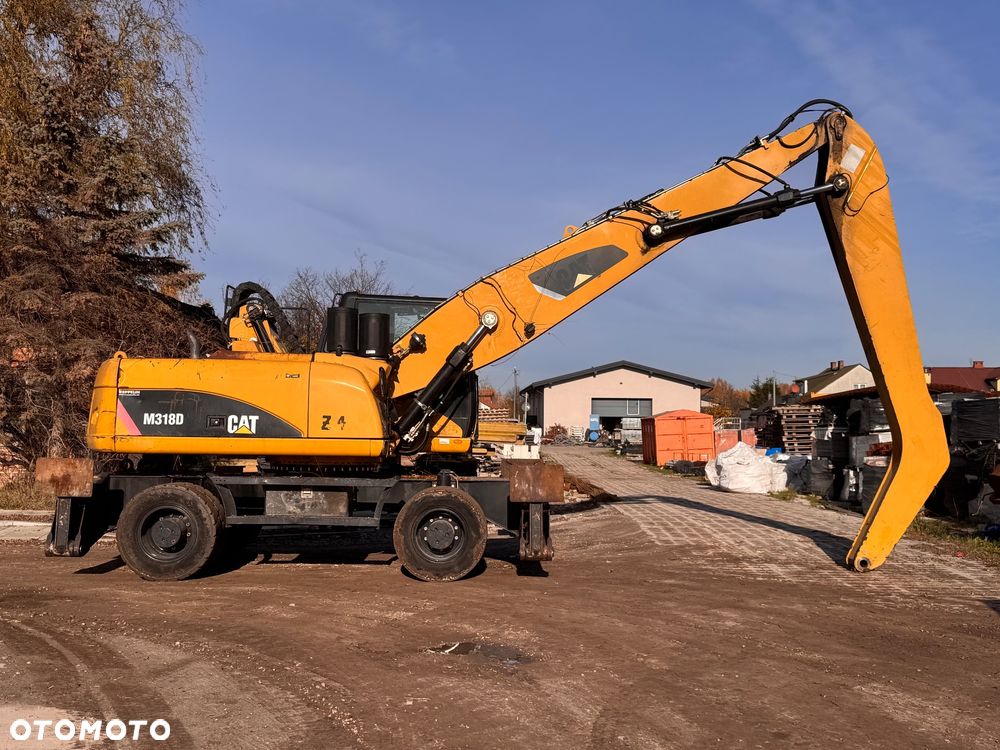 Caterpillar M318D - 4