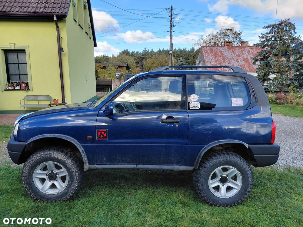 Suzuki Grand Vitara 2.0 - 10