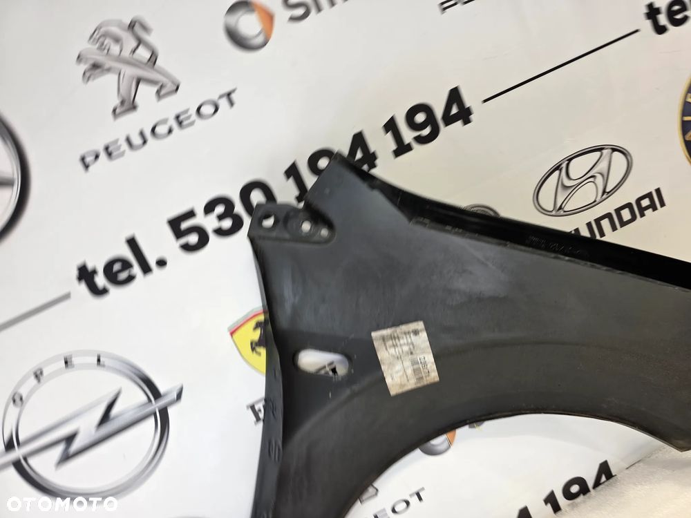 FORD FIESTA MK6 , LIFT 02-08 LEWY BŁOTNIK PRZEDNI PRZÓD NR AUKCJI BŁ250 - 18