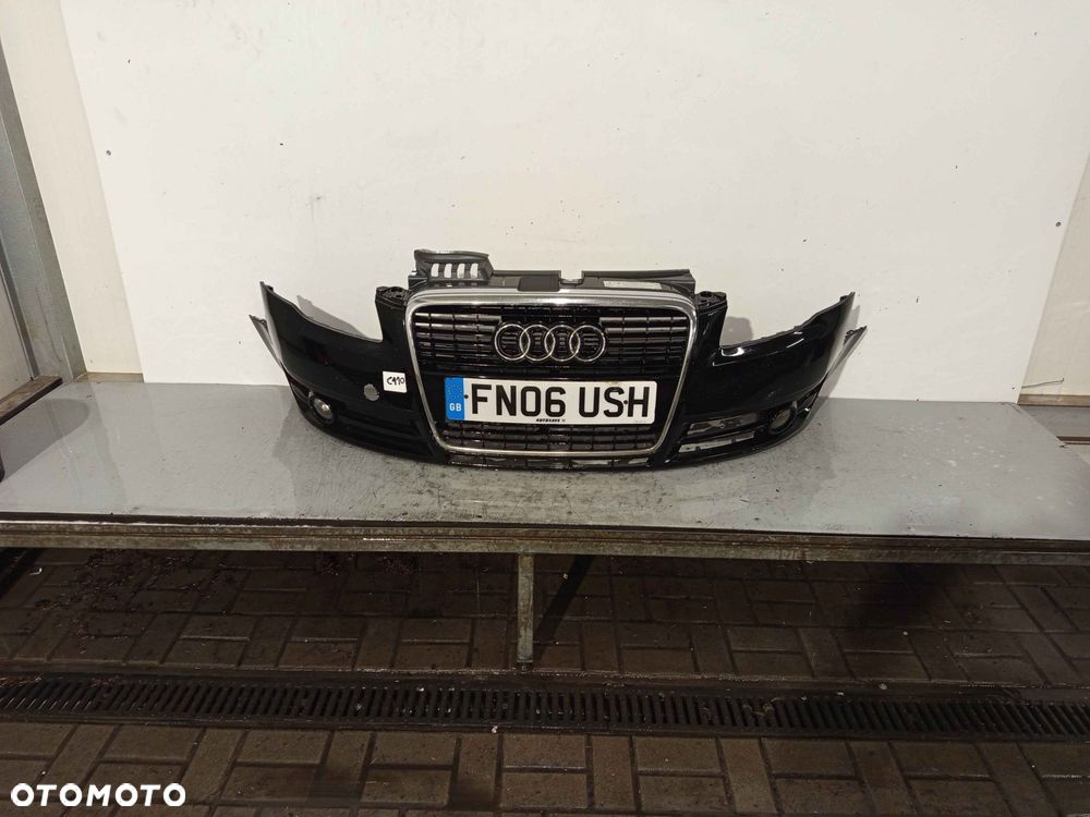 ^ ZDERZAK PRZÓD PRZEDNI AUDI A4 B7 LC9Z CZARNY HALOGENY - 1
