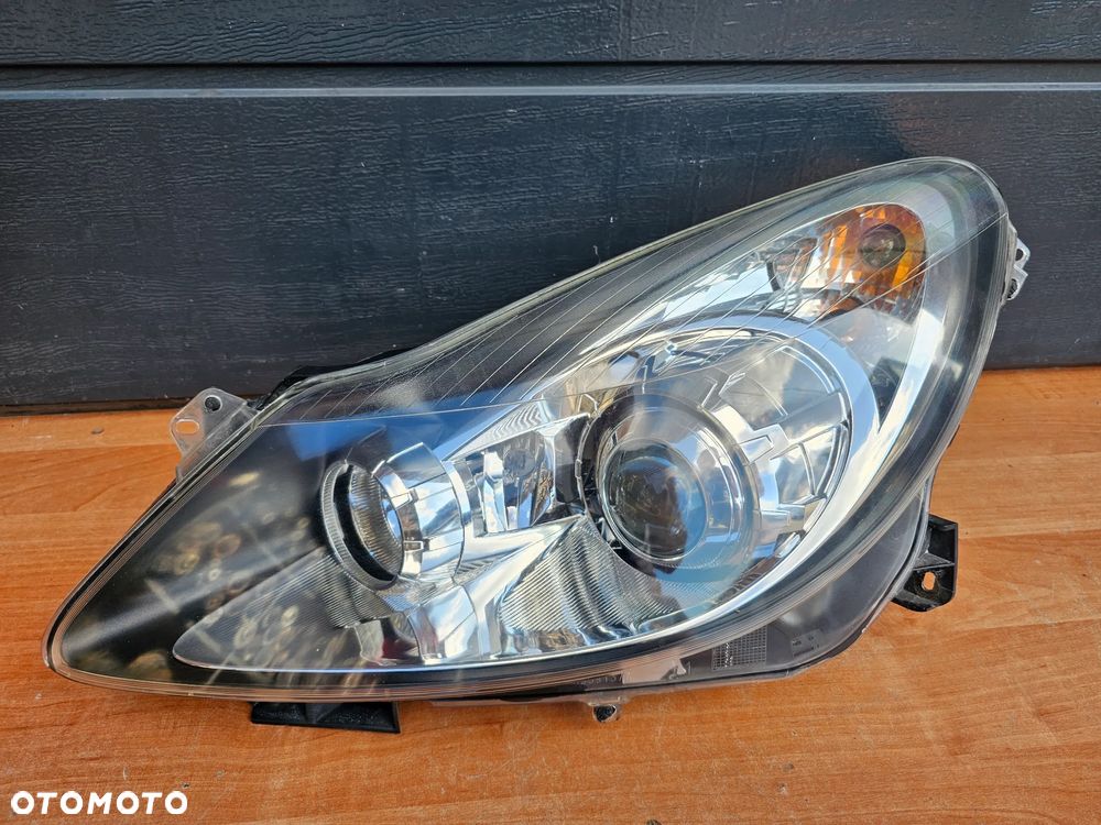 LAMPA SOCZEWKA LEWY PRZÓD LEWA PRZEDNIA OPEL CORSA D EUROPA 13186385