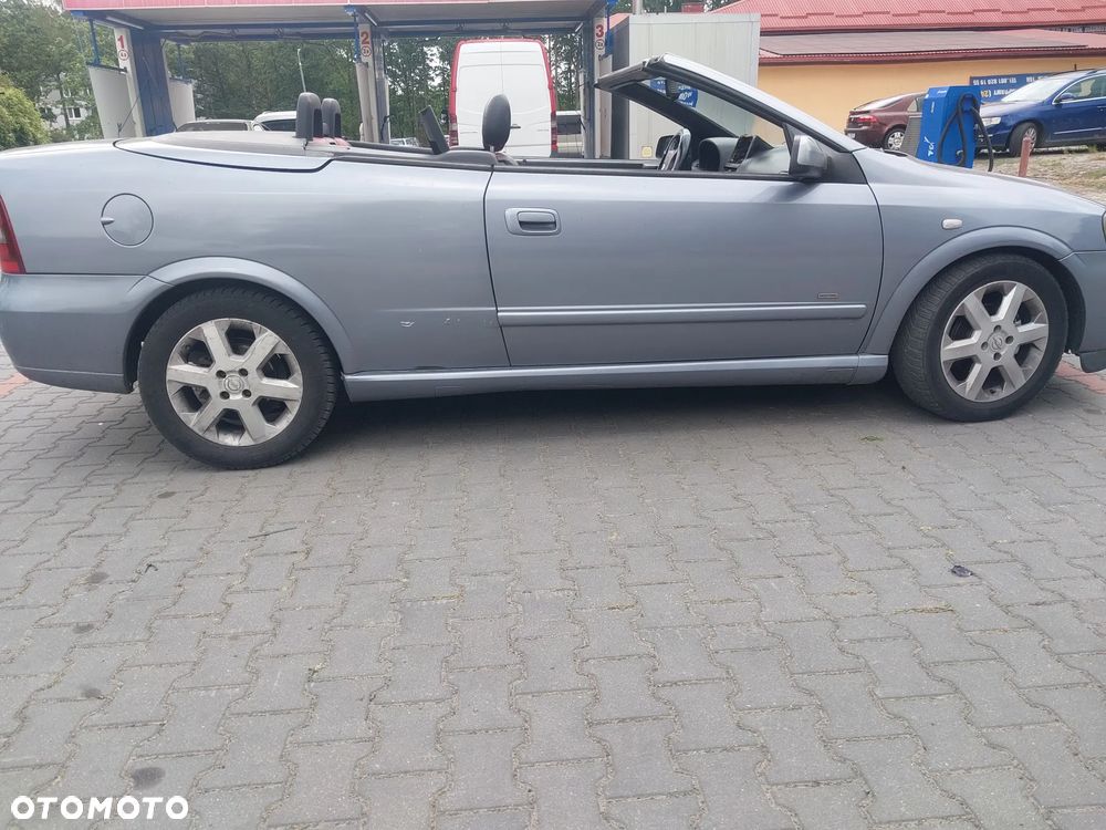 Opel Astra G Bertone Cabrio Cabriolet silnik 1.6 16v 103 KM skrzynia biegów F17 drzwi maska zderzak błotnik lusterko klapa Z4AU Z163 dach dachu składanego maglownica szyba podnośnik fotel kanapa zegary zestaw startowy czujnik felga maglownica zwrotnica sterownik panel moduł listwa wydech tłumik belka sanki zacisk jarzmo tarcza NA CZĘŚCI WSZYSTKIE CZĘŚCI - 15