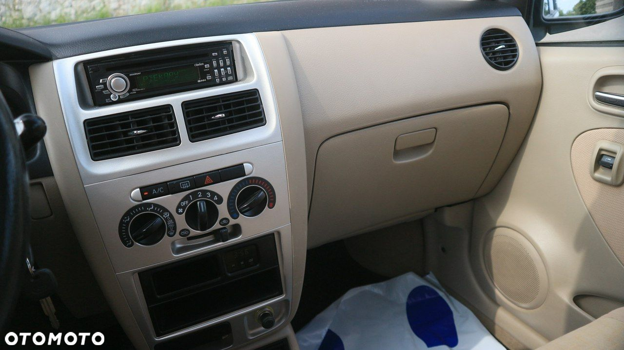 Daihatsu Cuore 1.0 Top - 33