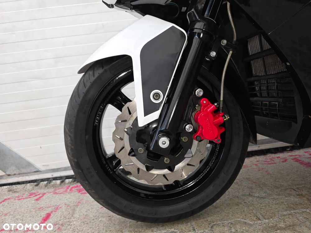 Kymco Xciting - 12
