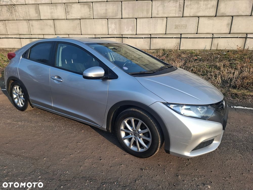 Honda Civic 1.4 i-VTEC Elegance - 1