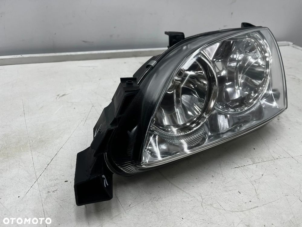 Lampa reflektor Toyota Avensis I T22 Lift 00-03r. NOWA lewa oryginał Europa jasna lewy przód 92101a2 - 2