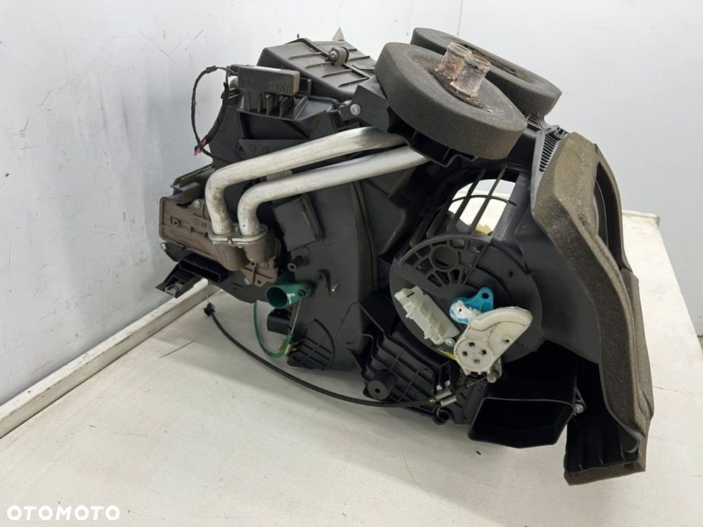 Nagrzewnica Dacia Logan MCV I 06-13r. Z KLIMATYZACJĄ obudowa chłodnicy wody parownik klimatyzacji - 4