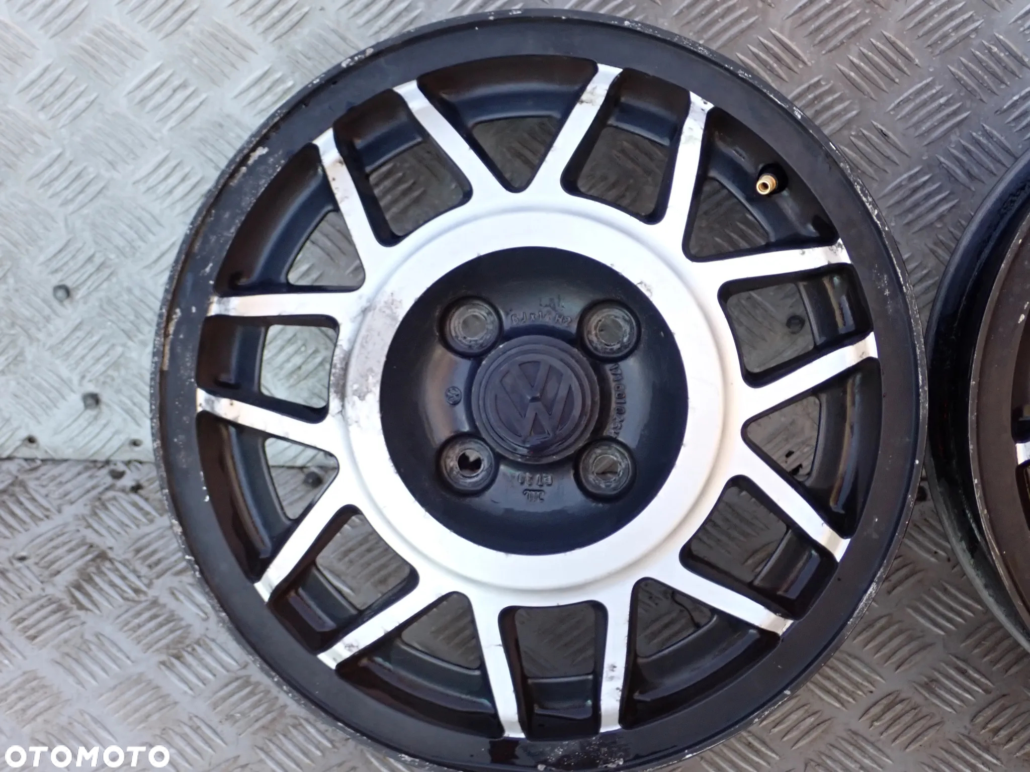 FELGI ALUMINIOWE VW GOLF SCIROCCO 6JX14  ET 38  4X100  PIASTA 57,1  171601025H - 4